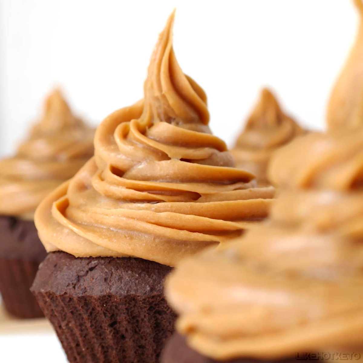 Low-carb chocolate cupcake with peanut butter whey protein frosting.