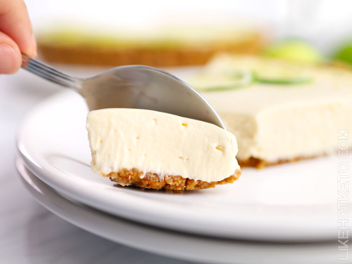 Spoon of of Key lime pie cheesecake.