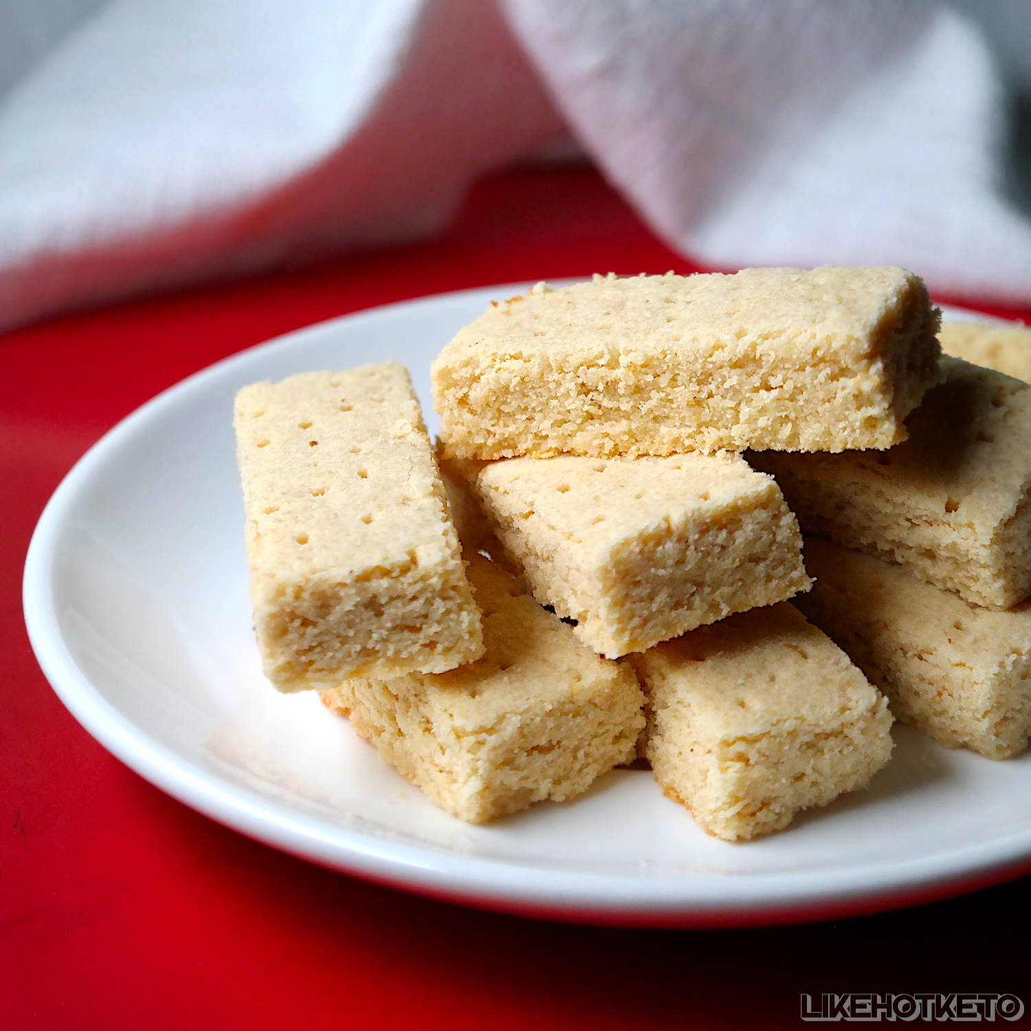 Sugar-free Scottish shortbread cookies piled up on a plate.