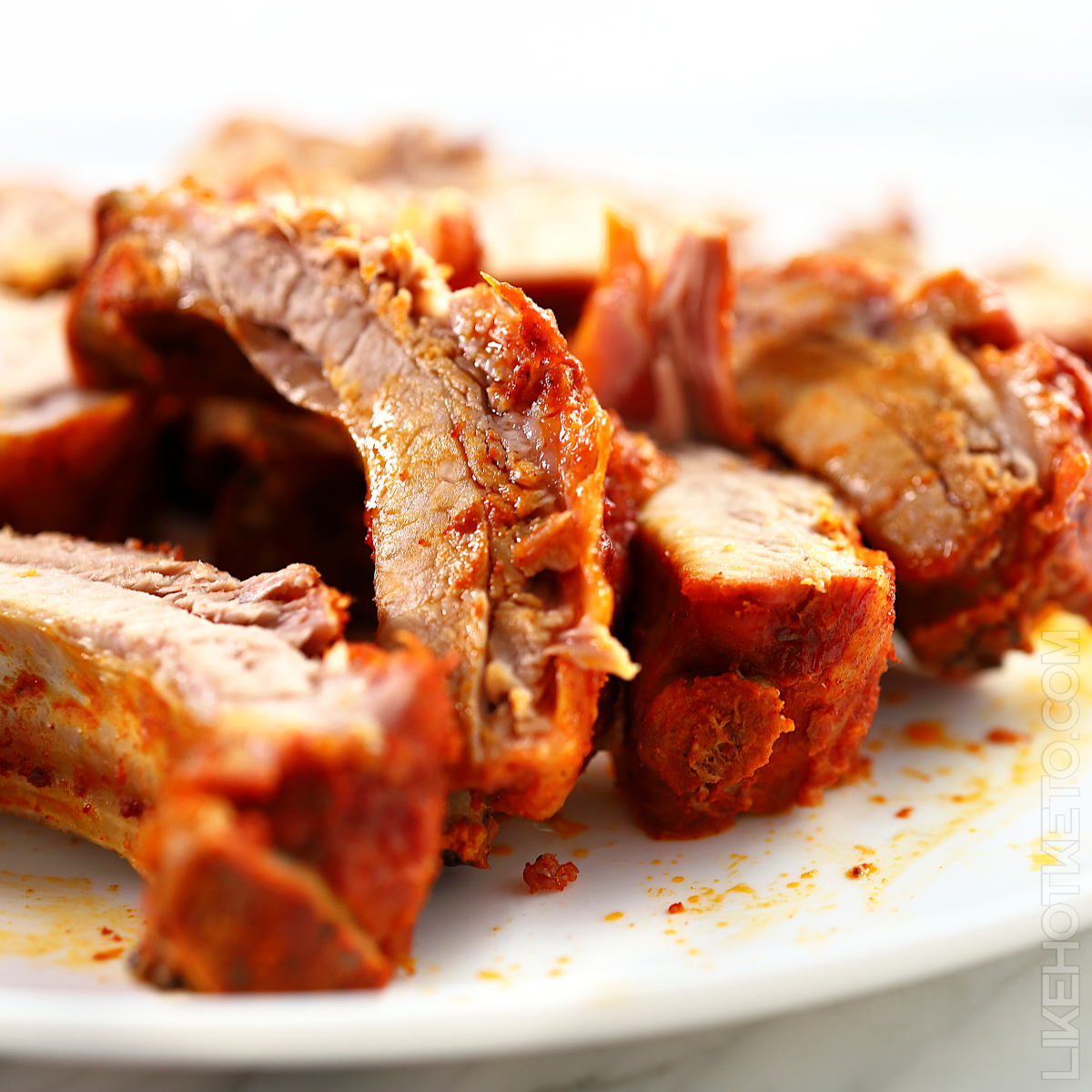 A plate of tender smoky chipotle pork ribs. Lazy keto meals.