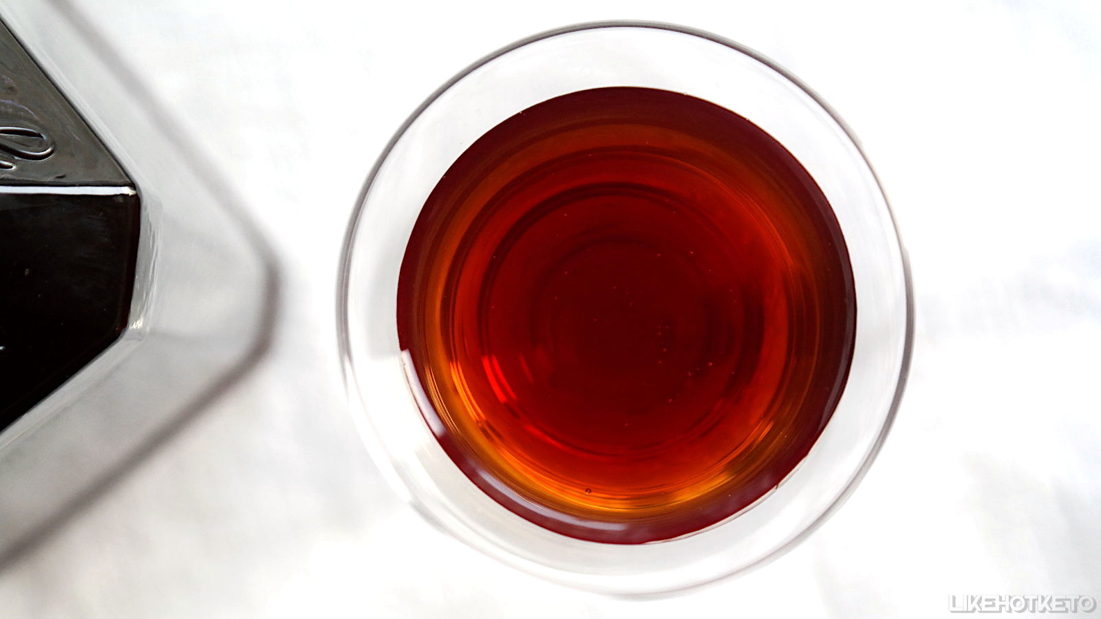 Top view of a glass of DYI cacao liqueur.