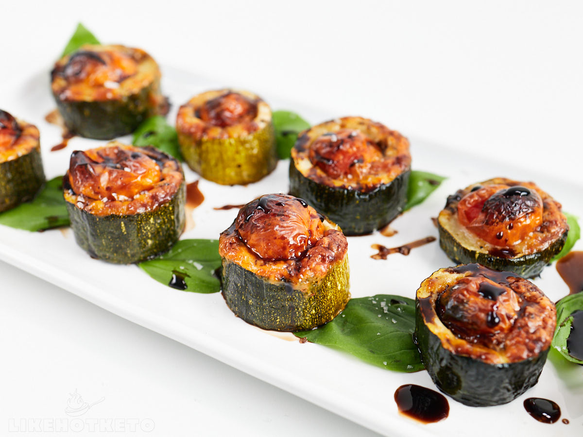 Zucchini caprese appetizers topped with balsamic.