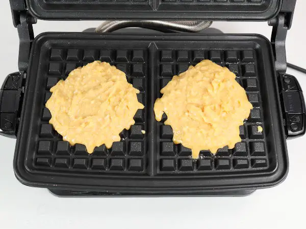 Chicken chaffle batter in waffle iron.