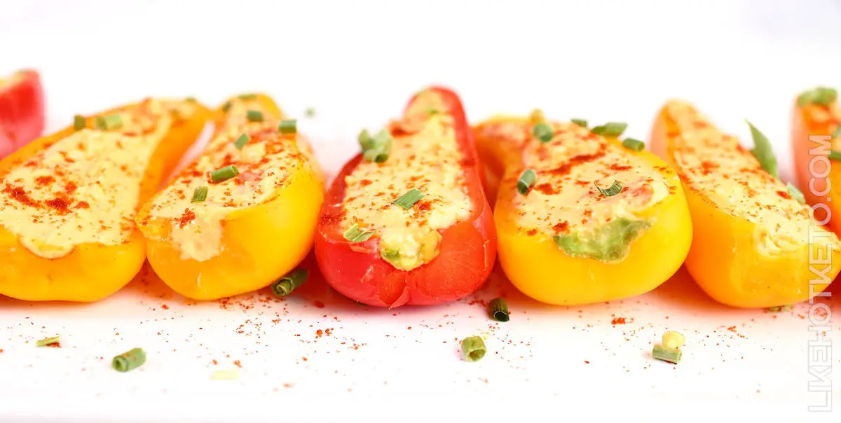 Cream cheese and cheddar stuffed baby peppers.
