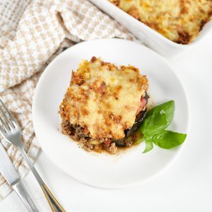 Slice of ground beef eggplant casserole with cheese.