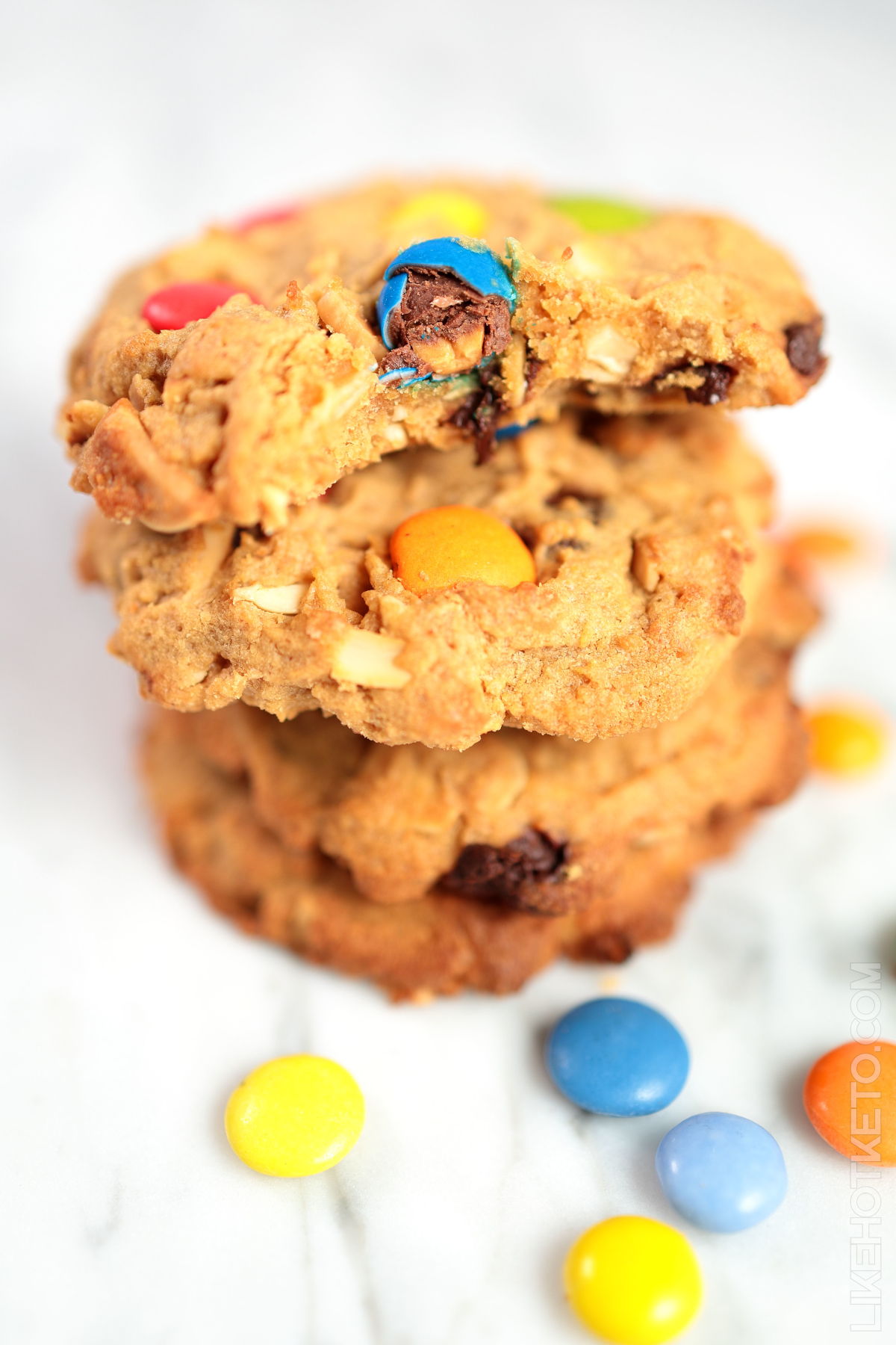 A pile of lupin flour monster cookies with keto M&M's.