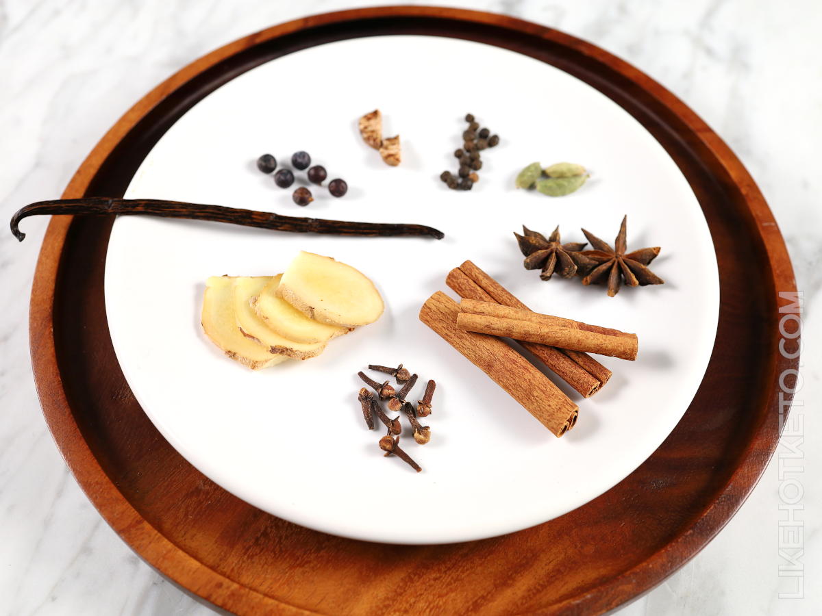Mulled wine spices on a white plate.