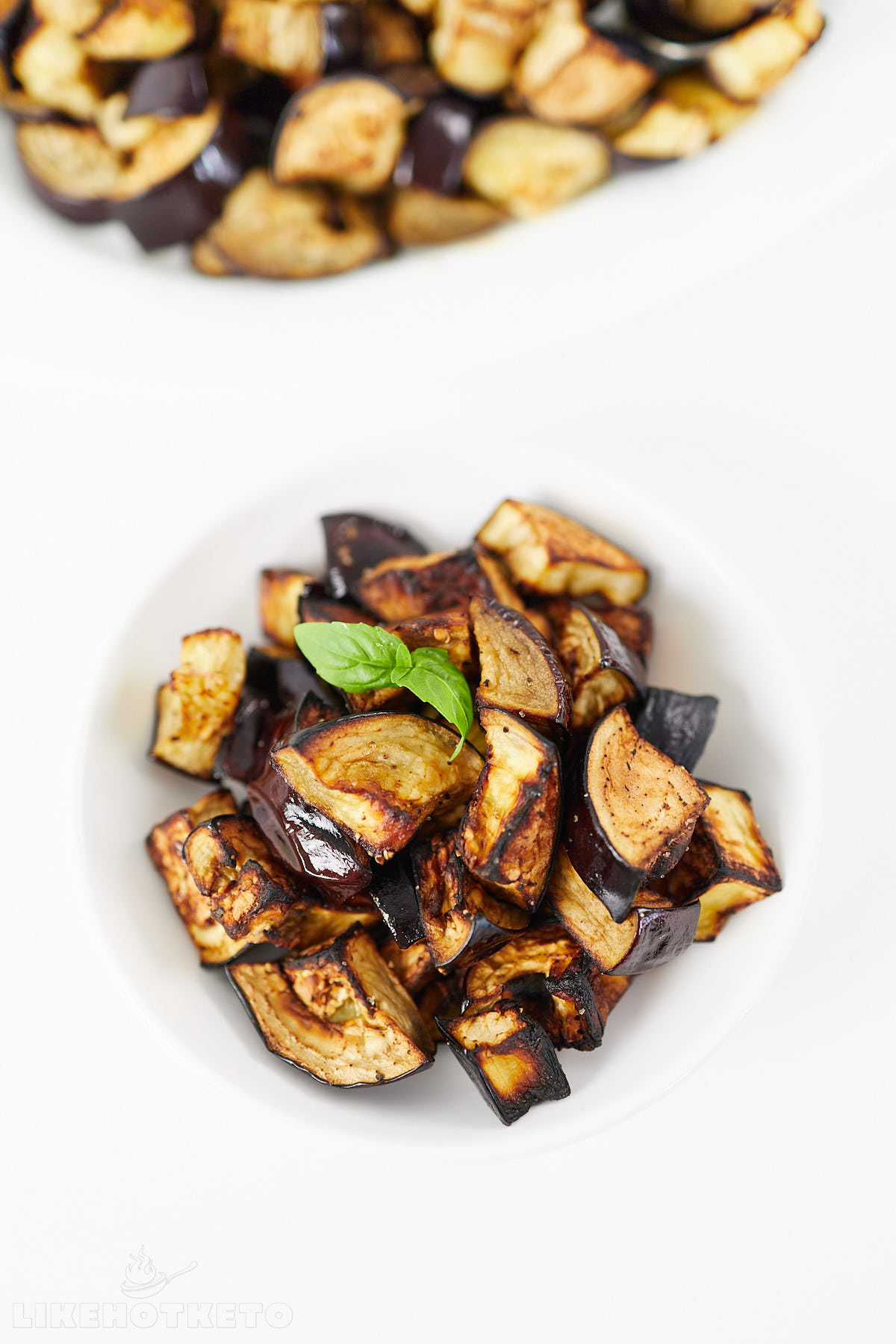 Oven roasted, golden brown pieces of eggplant.