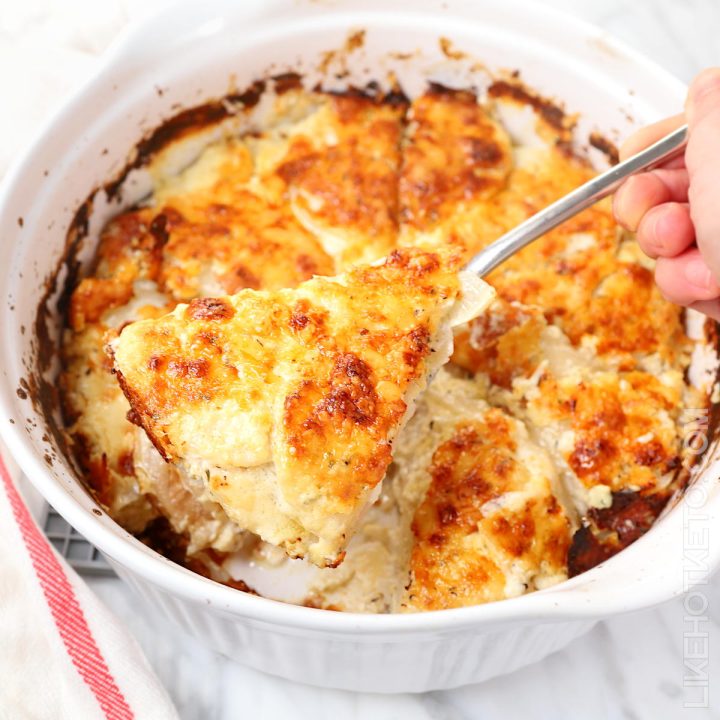 Keto scalloped turnips au gratin with a golden brown crust of Gruyere cheese.