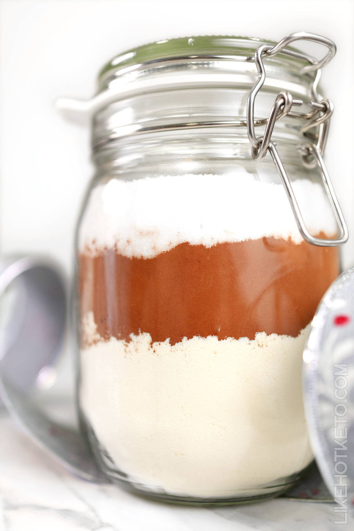 Mason jar with homemade high protein hot cocoa as a gift.